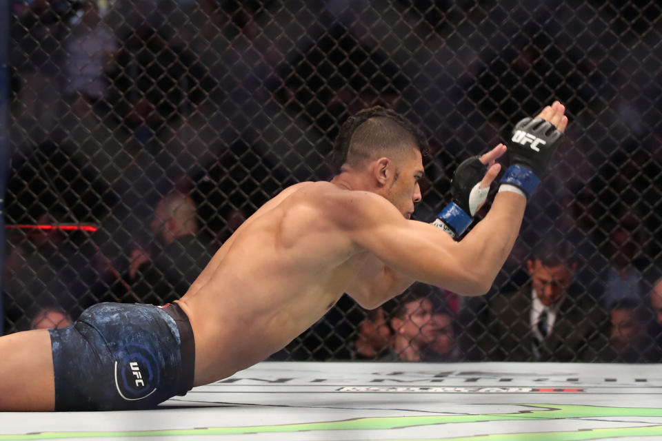 Johnny Walker of Brazil hurt himself celebrating after a knockout of Misha Cirkunov at UFC 235. (Getty Images)