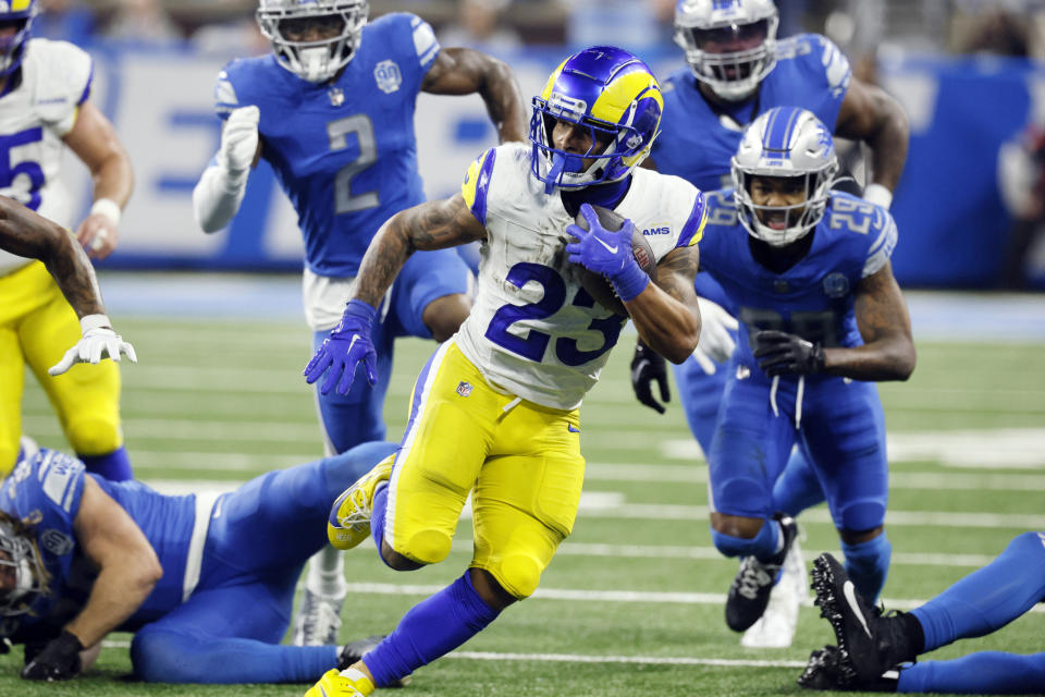 Los Angeles Rams running back Kyren Williams (23) rushes during the second half of an NFL wild-card playoff football game against the Detroit Lions, Sunday, Jan. 14, 2024, in Detroit. (AP Photo/Duane Burleson)