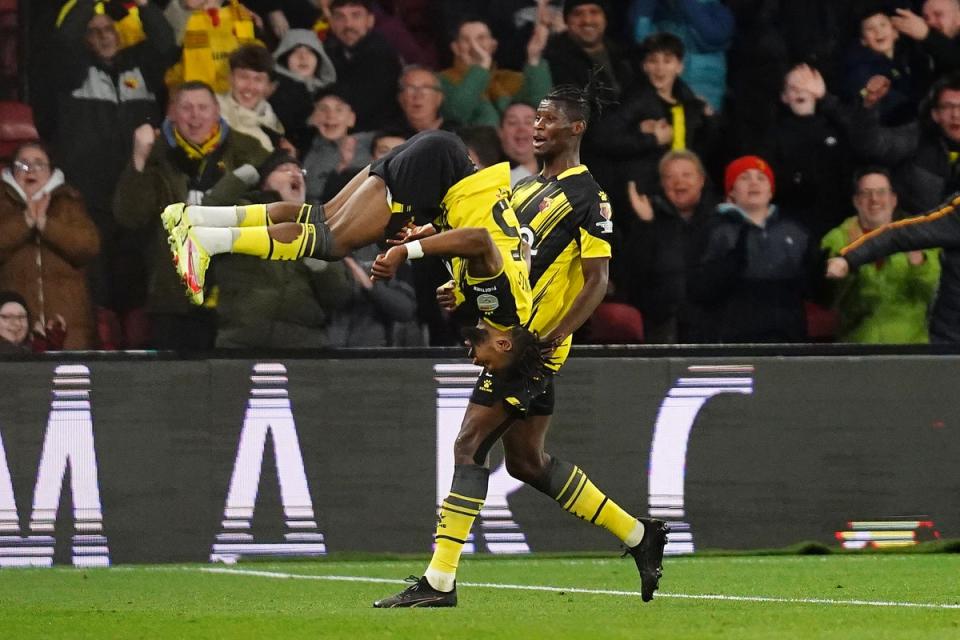 Emmanuel Dennis celebrated restoring Watford’s lead with a backflip (John Walton/PA Wire)