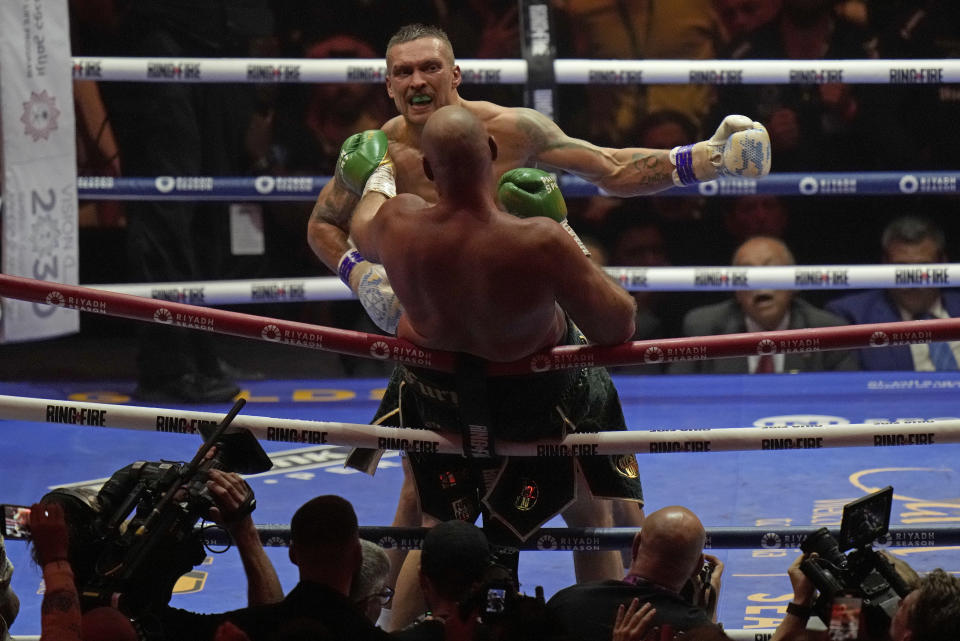 Ukraine's Oleksandr Usyk launches an attack on Britain's Tyson Fury during their undisputed heavyweight world championship boxing fight at the Kingdom Arena in Riyadh, Saudi Arabia, Sunday, May 19, 2024. (AP Photo/Francisco Seco)