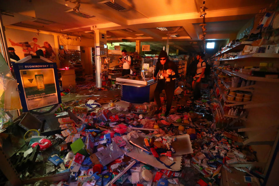 <p>A shop is looted during anti-G20 protests on the first day of the G20 summit in Hamburg, Germany, July 7, 2017. (Pawel Kopczynski/Reuters) </p>