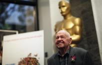 Mickey Rooney poses at a screening of "It's a Mad Mad Mad Mad World" to kick off The Last 70mm Film Festival at the Academy of Motion Picture Arts and Sciences in Beverly Hills, California, July 9, 2012. REUTERS/Mario Anzuoni/Files
