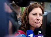 Silene Fredriksz-Hoogzand speaks to the media in Nieuwegein, Netherlands, on Wednesday, June 19, 2019, after being informed by international prosecutors that four suspects have been identified in the international criminal investigation into the downing of Malaysia Airlines Flight 17. Fredriksz-Hoogzand's son Bryce and his girlfriend, Daisy Oehlers, were among 298 passengers and crew killed when the flight from Amsterdam to Kula Lumpur was shot down over eastern Ukraine on July 17, 2014. (AP Photo/Mike Corder)