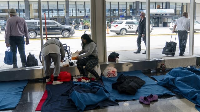 Migrants in a makeshift shelter at O'Hare International Airport.