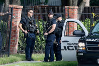 <p>Investigators looks over the scene where nine individuals were shot at a strip mall along Weslayan St. on September 26, 2016 in Houston, Texas. (Bob Levey/Getty Images) </p>