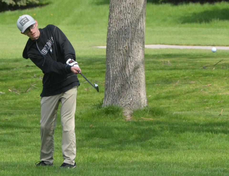 Doland's Kaiden Weinreis hits to the No. 1 Yellow green during the 2022 Region 1B high school golf tournament at Cattail Crossing Golf Course.