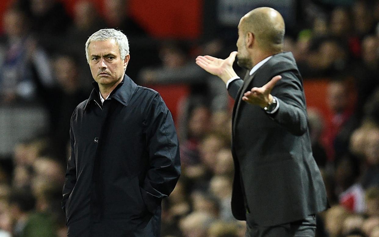 Mourinho and Guardiola - AFP