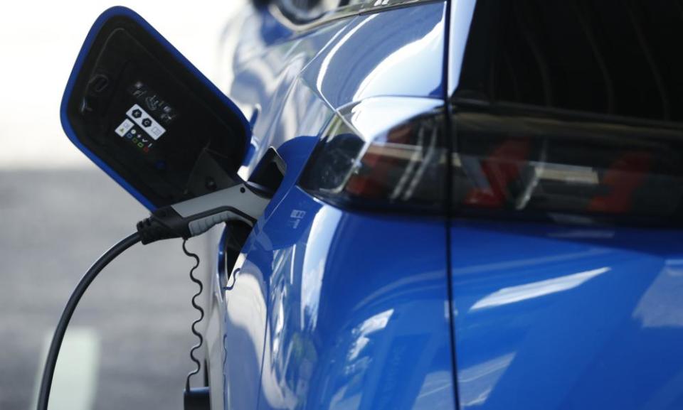 An electric vehicle at a charging station in Ingliston, Scotland