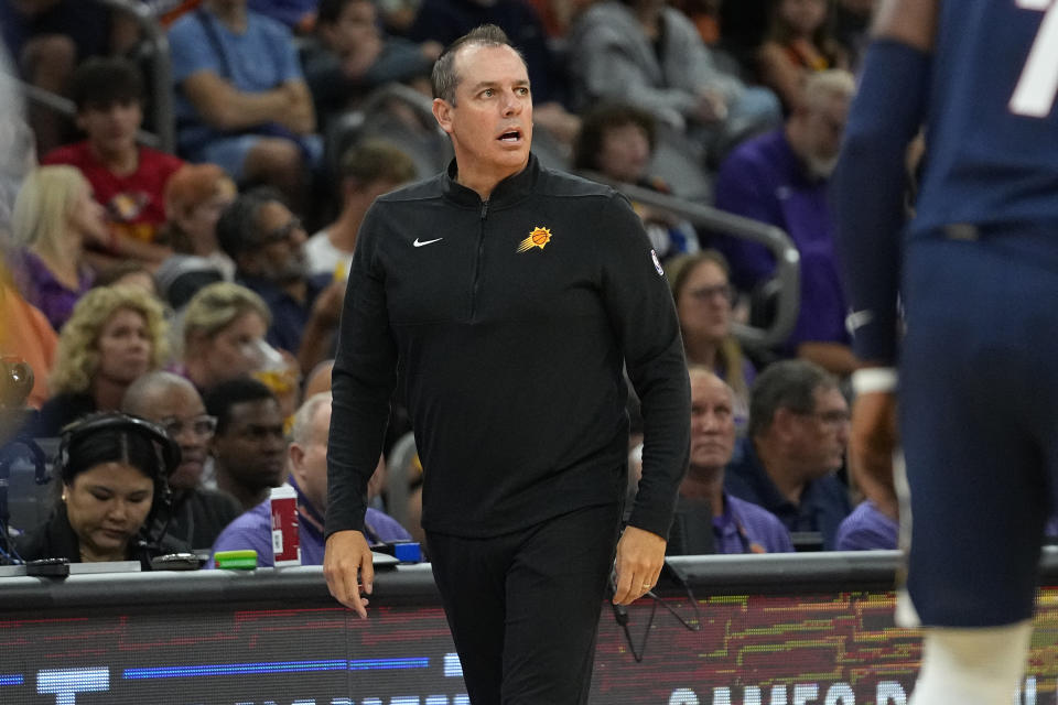 Phoenix Suns head coach Frank Vogel watches during the first half of an NBA basketball preseason game against the Denver Nuggets, Tuesday, Oct. 10, 2023, in Phoenix. (AP Photo/Matt York)