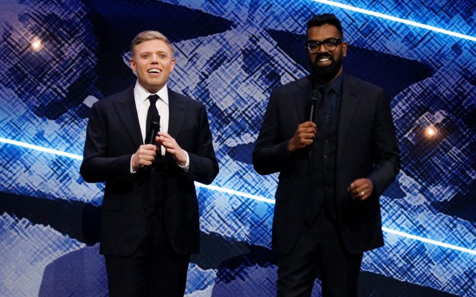 Rob Beckett and Romesh Ranganathan on stage at the Royal Variety Performance in 2019 - Matt Frost/ITV/Shutterstock