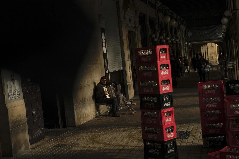 A musician plays his accordion