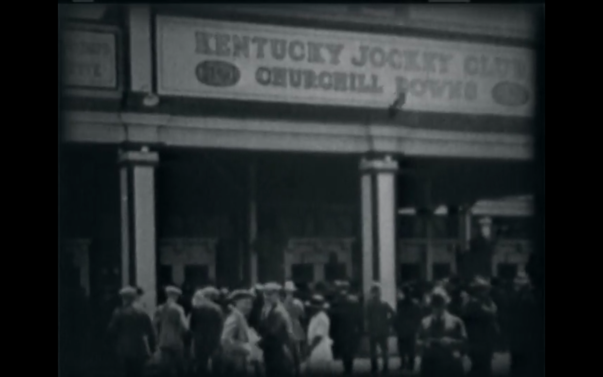 This scene from the 1922 "The Kentucky Derby" film shows an view of what the outside of the Kentucky Jockey Club looked like a century ago.