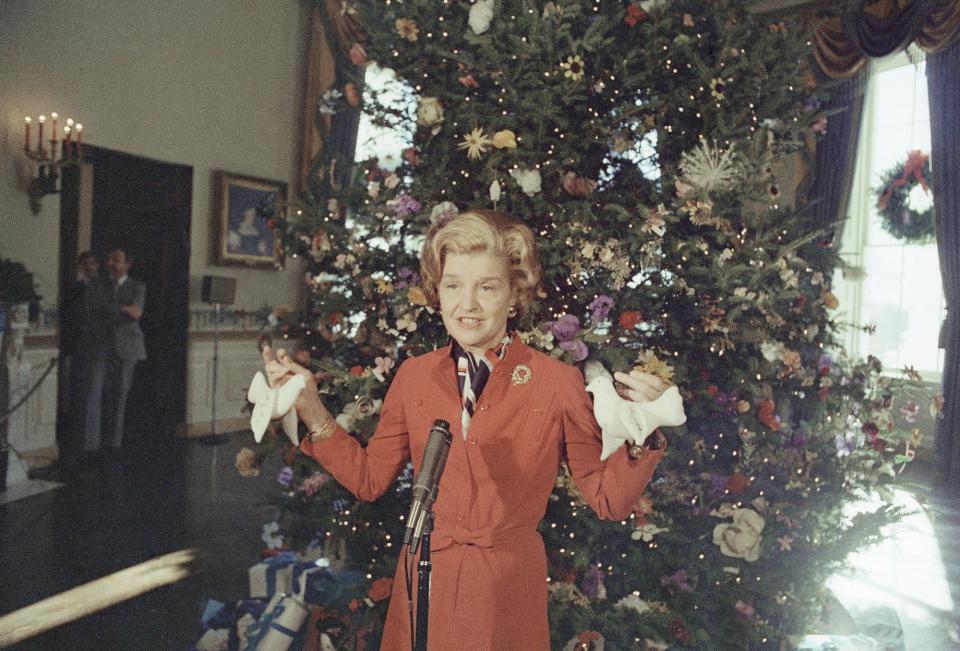 First lady Betty Ford in front of the White House Christmas tree in 1976.