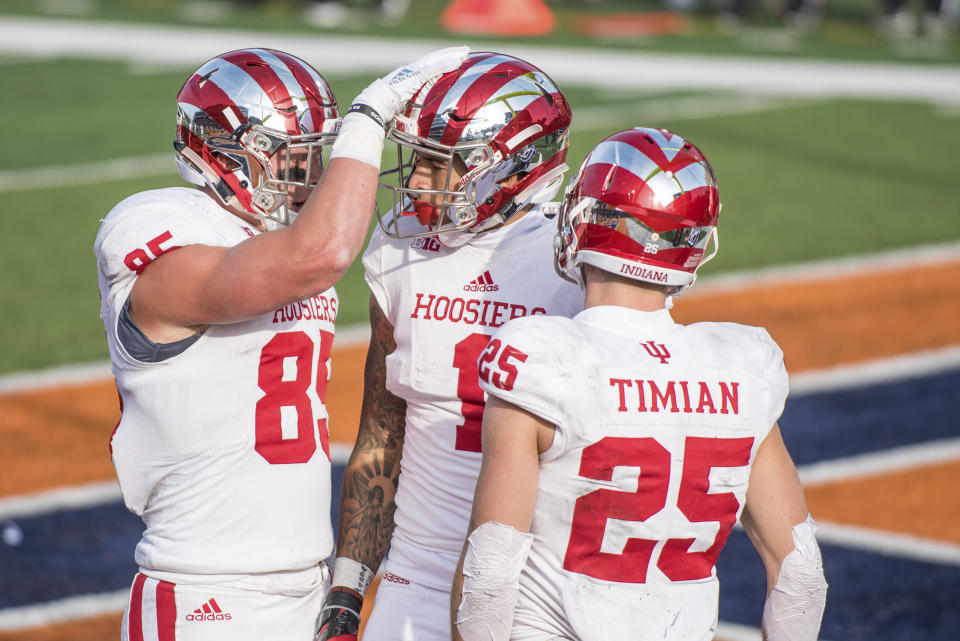 Indiana wide receiver Simmie Cobbs Jr. is congratulated by tight end Ryan Watercutter after his touchdown catch against Illinois. (AP Photo)