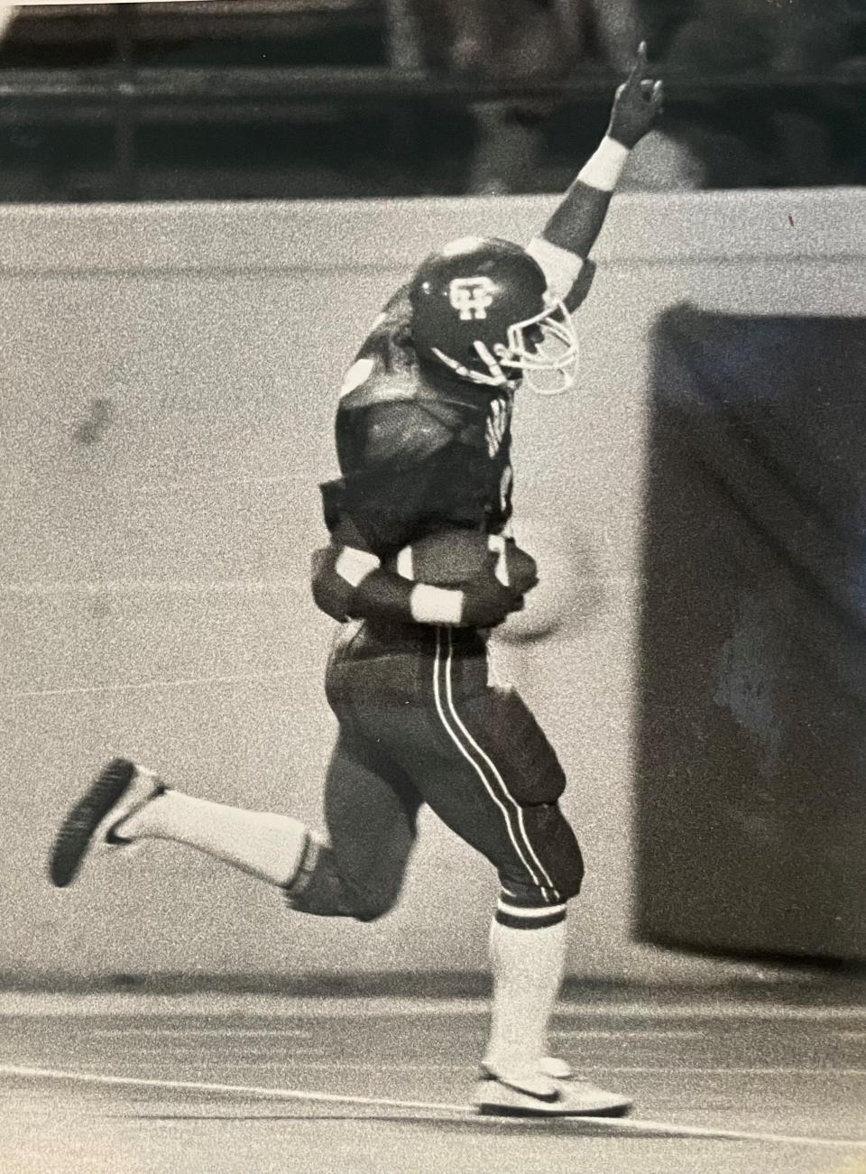 John Wooldridge runs the ball for Central-Hower High School.