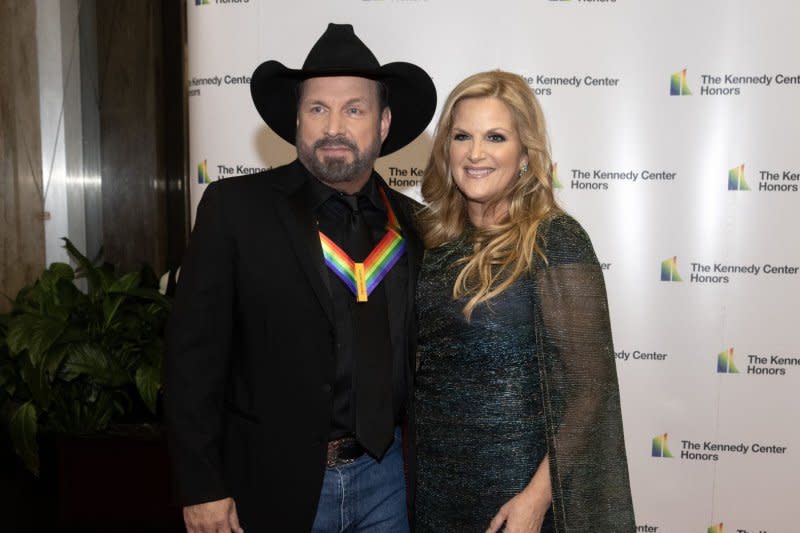 Garth Brooks (L) and Tricia Yearwood attend the Kennedy Center Honors Artist's Dinner in 2022. File Photo by Ron Sachs/UPI