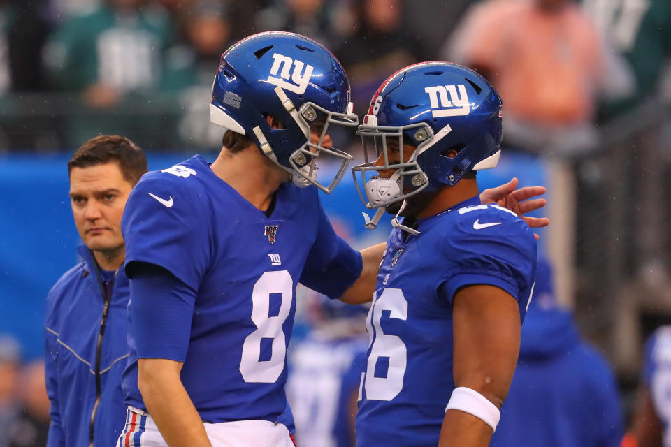 EAST RUTHERFORD, NJ - DECEMBER 29:  New York Giants quarterback Daniel Jones (8) and New York Giants running back Saquon Barkley (26) prior to the National Football League game between the New York Giants and the Philadelphia Eagles on December 29, 2019 at MetLife Stadium in East Rutherford, NJ.  (Photo by Rich Graessle/Icon Sportswire via Getty Images)