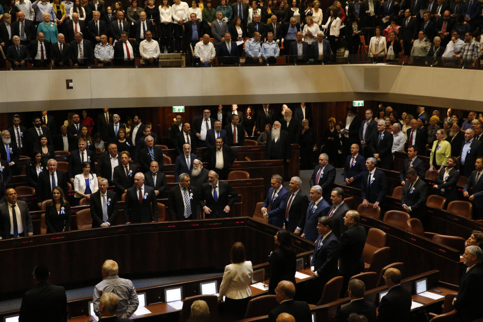 The general view of the plenum during the swearing in ceremony at the Caesar Premier Jerusalem in Jerusalem, Tuesday, April 30, 2019. Members of Israel's parliament are being sworn in at the Knesset, the country's legislature, three weeks after a tumultuous national election.(AP Photo/Ariel Schalit)