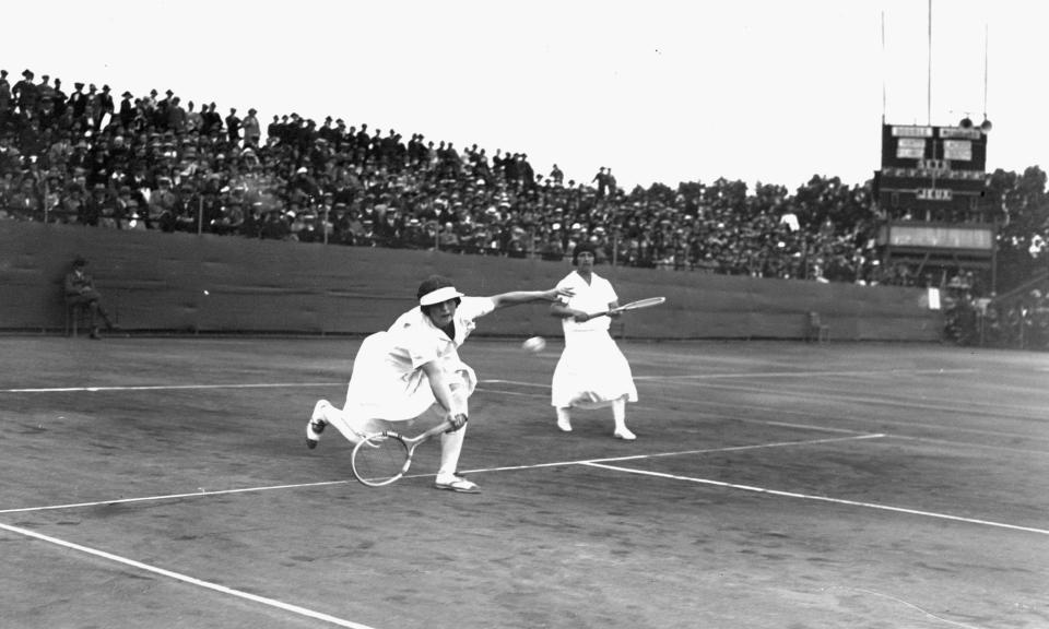 <span>US tennis doubles partners Helen Wills, left, and Hazel Hotchkiss Wightman in action during the 1924 Olympics. </span><span>Photograph: Hulton Archive/Getty Images</span>