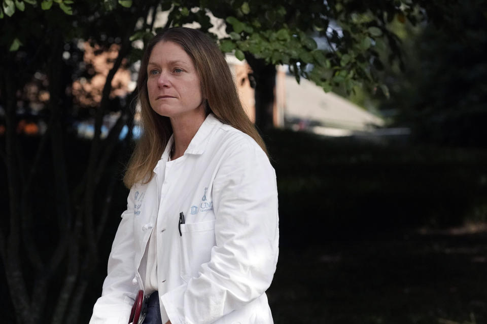 Dr. Hanna Sanoff poses for a portrait at UNC Hospitals in Chapel Hill, N.C., Tuesday, Sept. 15, 2020. Grief is an inescapable part of the job for cancer doctors. “I have not yet figured out how to help guide patients’ struggles with cancer, leading them toward a death with dignity and finding personal reward in our relationship, when I cannot see them (or) hug them” she says. (AP Photo/Gerry Broome)