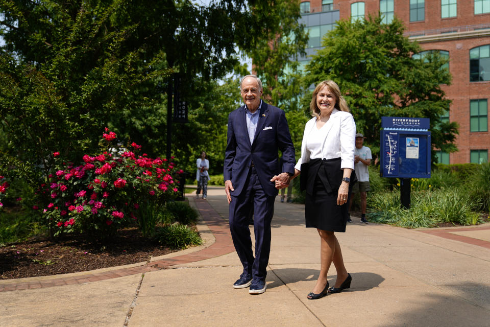 Sen. Tom Carper, D-Del., accompanied by his wife Martha, arrives for a news conference in Wilmington, Del., Monday, May 22, 2023. Carper announced Monday that he will not seek re-election to a fifth term in the U.S. Senate. (AP Photo/Matt Rourke)