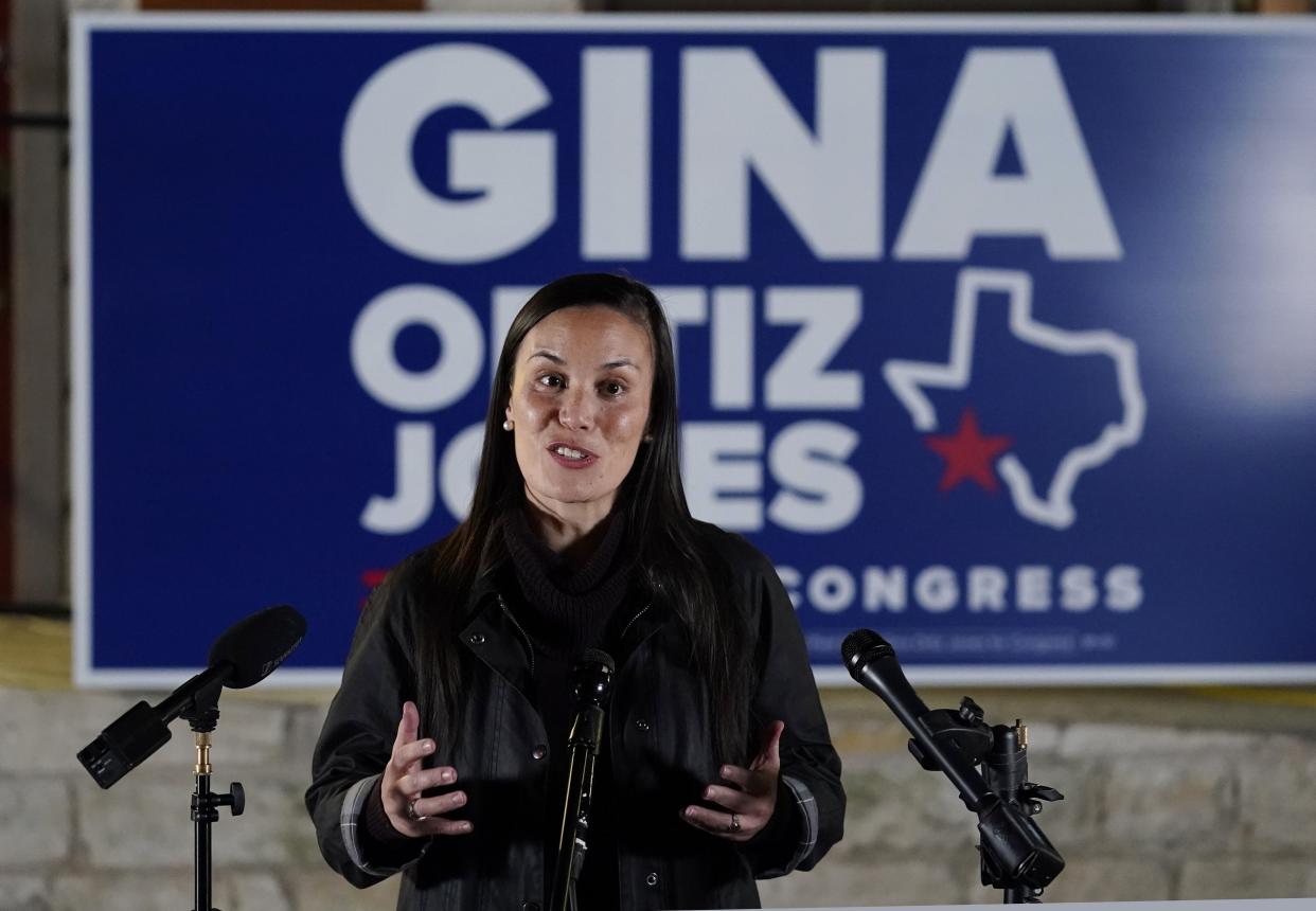 Democratic congressional candidate Gina Ortiz Jones talks with the media outside of her campaign headquarters, Tuesday, Nov. 3, 2020, in San Antonio.