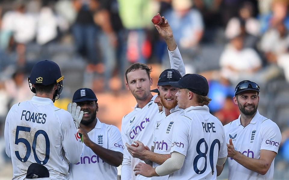 England's Tom Hartley (C) celebrates after taking five wickets during the fourth day of the first Test cricket match between India and England at the Rajiv Gandhi International Stadium in Hyderabad on January 28, 2024