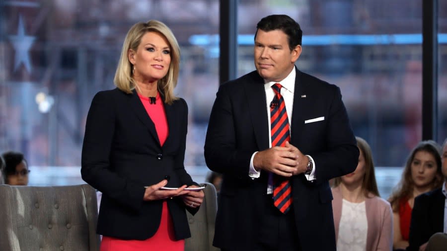 Bret Baier, right, and Martha MacCallum, left, stand during a Fox News town-hall style event with Sen. Bernie Sanders on April 15, 2019 in Bethlehem, Pa. The first 2024 Republican presidential debate on Wednesday, Aug. 23, 2023, is being moderated by Fox News hosts Bret Baier and Martha MacCallum. (AP Photo/Matt Rourke, File)