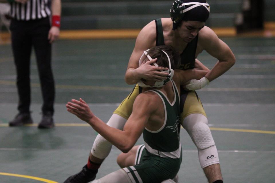 St, Mary Catholic Central's Michael Lynch works for a takedown Saturday during the New Year's Duals at SMCC.