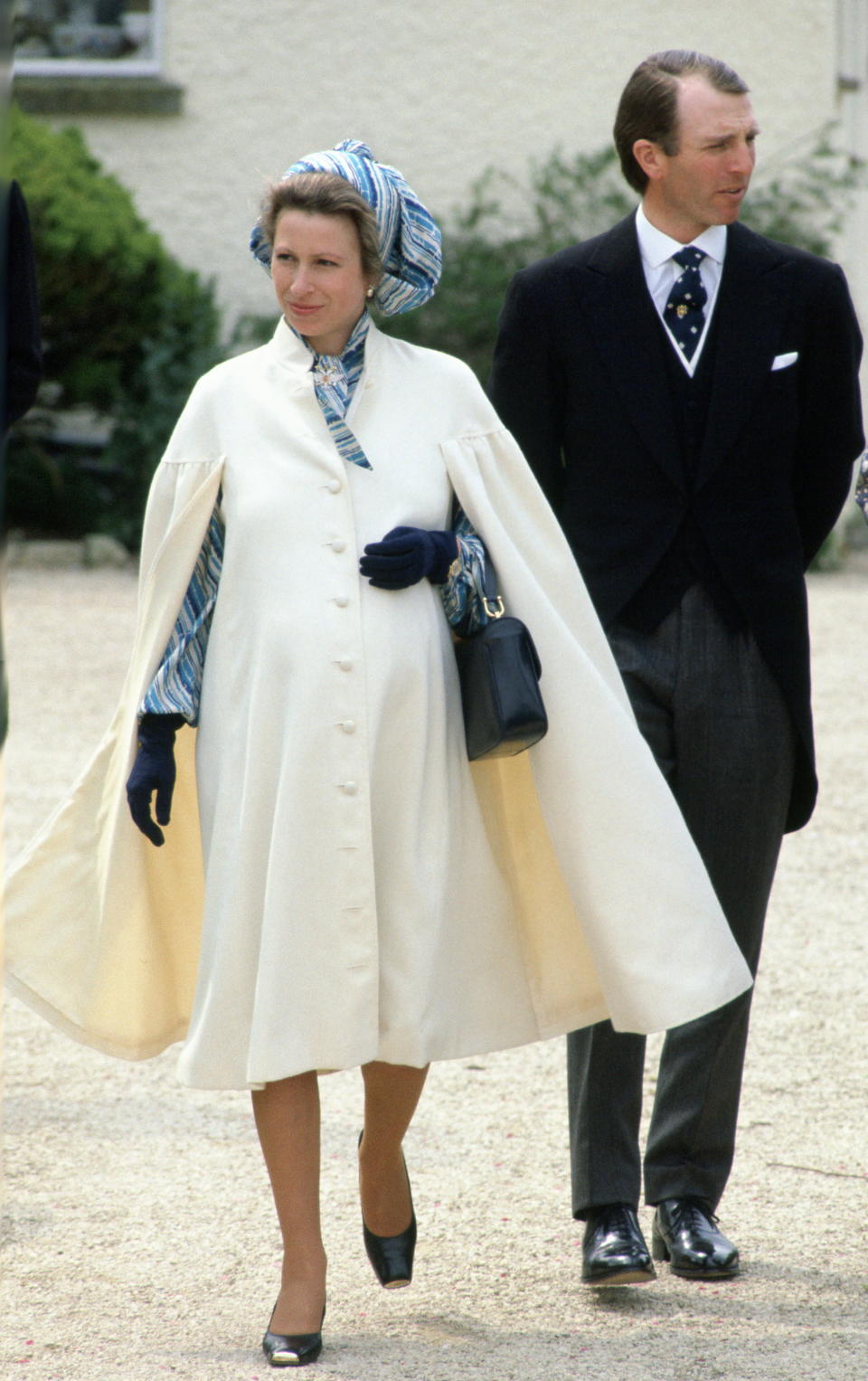 <p>In May 1981, Princess Anne and her then-husband Mark Phillips attended a close friend’s wedding. For the outing, Princess Anne dressed her bump in a Pinterest-worthy cape coat and ’80’s style headscarf. She was expecting daughter Zara Tindall at the time. <em>[Photo: Getty]</em> </p>