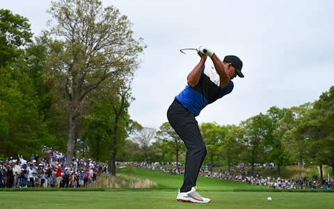 Brooks Koepka hits from the 2nd tee - Credit: Getty Images North America