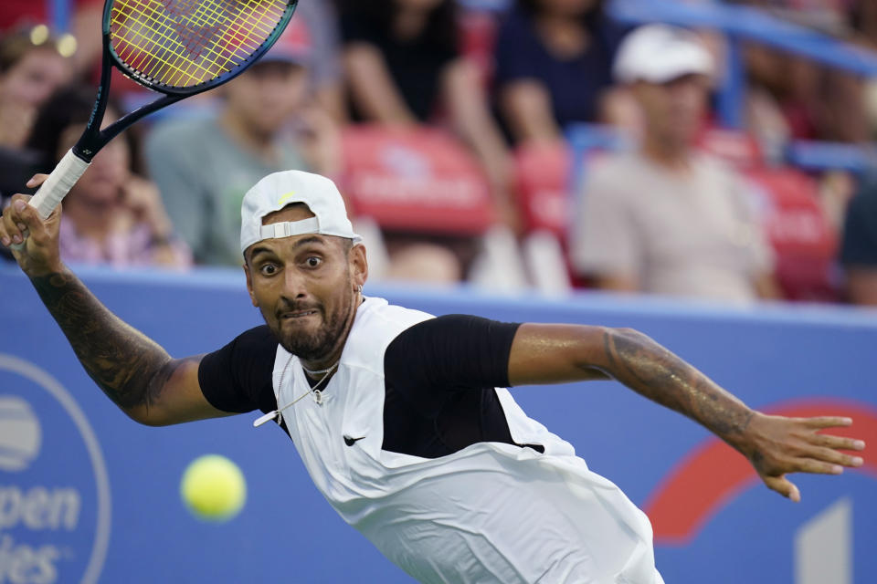 Nick Kyrgios, of Australia, prepares to hit a forehand to Marcos Giron, of the United States, at the Citi Open tennis tournament in Washington, Tuesday, Aug. 2, 2022. (AP Photo/Carolyn Kaster)