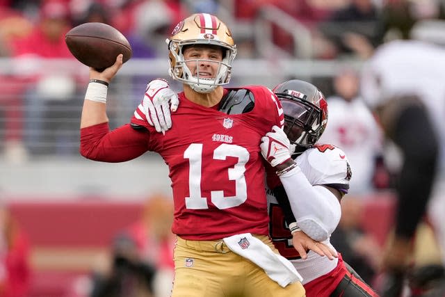 San Francisco 49ers quarterback Brock Purdy (13) passes 