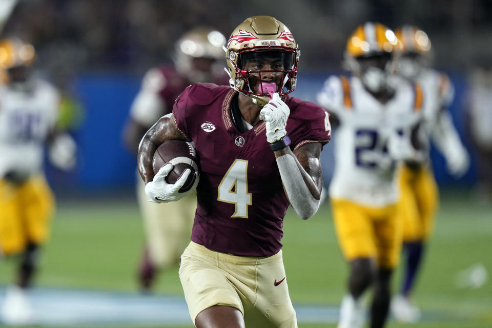 Keon Coleman and the 'Noles look to stay ahead of the pack. (AP Photo/John Raoux)