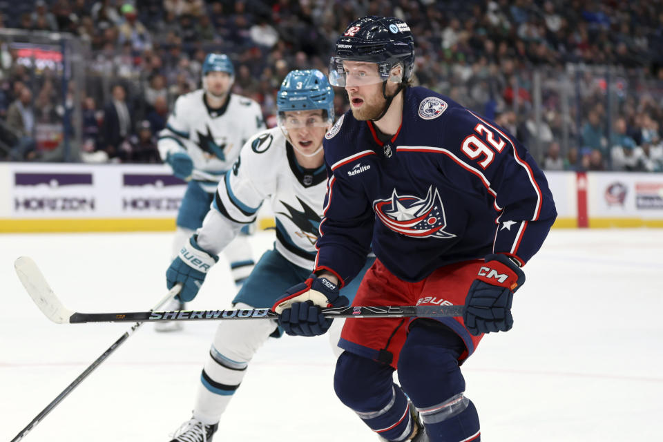 Columbus Blue Jackets forward Alexander Nylander (92) skates in front of San Jose Sharks defenseman Henry Thrun during the second period of an NHL hockey game in Columbus, Ohio, Saturday, March 16, 2024. The Blue Jackets won 4-2. (AP Photo/Paul Vernon)
