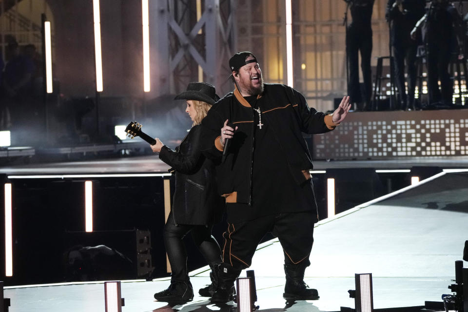 Melissa Etheridge, left, and Jelly Roll perform during "Live From Detroit: The Concert at Michigan Central" on Thursday, June 6, 2024, in Detroit. (AP Photo/Carlos Osorio)