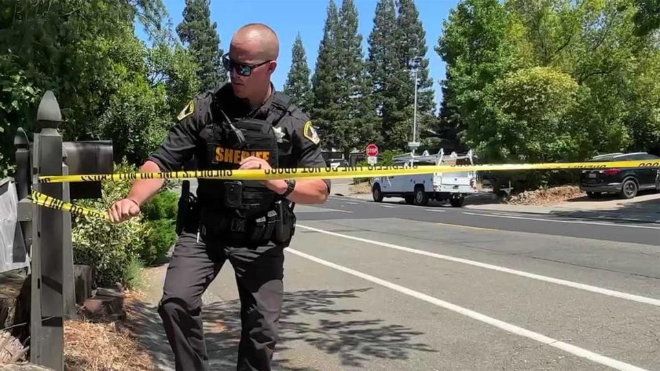 A deputy closes Blue Oak Drive near Madison Avenue during a standoff Friday, June 21, 2024, with a barricaded suspect in Orangevale. The suspect, identified as Steven Kester, failed to appear at a court hearing Friday morning and deputies were relayed to a home to check on him after Kester became despondent.