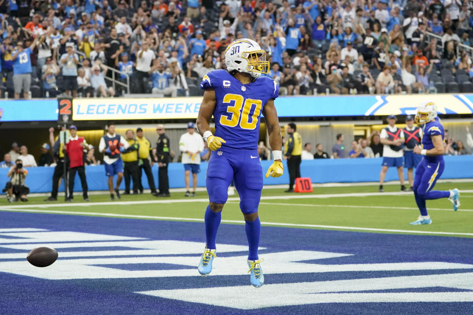 Los Angeles Chargers running back Austin Ekeler (30) celebrates his touchdown during the second half of an NFL football game against the Denver Broncos Sunday, Dec. 10, 2023, in Inglewood, Calif. (AP Photo/Marcio Jose Sanchez)