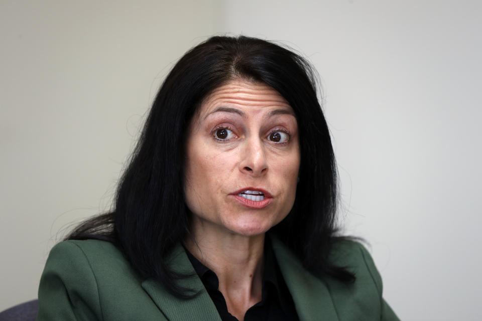 FILE - In this June 4, 2019, file photo, Michigan Attorney General Dana Nessel listens to a question from reporters in Detroit. On Tuesday, Oct. 27, 2020, a judge blocked a sudden ban on the open display of guns near Michigan polling places on Election Day. Gun-rights groups said Secretary of State Jocelyn Benson, a Democrat, had exceeded her authority in banning people from openly carrying guns within 100 feet of polling places. Critics argued that Benson failed to go through a formal rule-making process as required under state law. The judge agreed. Nessel pledged to appeal the judge’s decision with just days left until the election. (AP Photo/Paul Sancya, File)