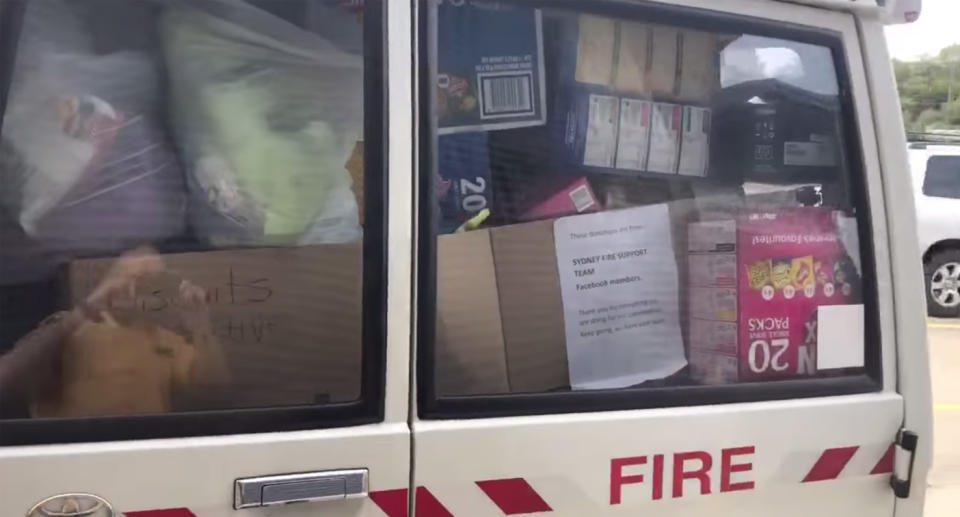 A NSW fire truck packed to the brim with food donations as crews work to move them to evacuation centres. Source: Facebook