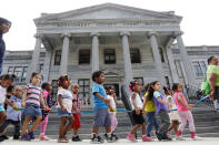 <p>A group of children is walked past the Montgomery County Courthouse where Bill Cosby is waiting for deliberations to finish on the eighth day of his sexual assault trial in Norristown, Pa., June 14, 2017. (Photo: Lucas Jackson/Reuters) </p>