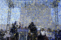 Confetti flies during the Los Angeles Rams' victory celebration at Los Angeles Memorial Coliseum in Los Angeles, Wednesday, Feb. 16, 2022, following the Rams' win Sunday over the Cincinnati Bengals in the NFL Super Bowl 56 football game. (AP Photo/Marcio Jose Sanchez)