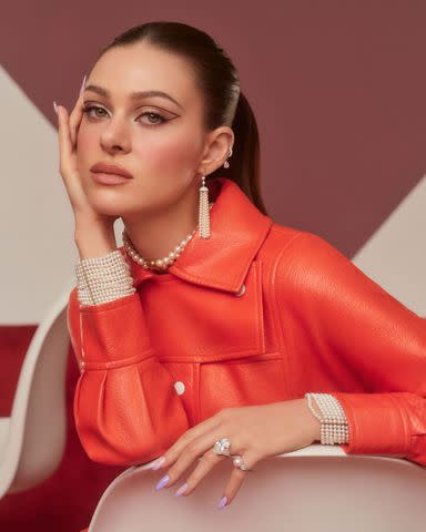 <p>Emman Montalvan. Vintage Coat: Courrèges by Aralda vintage, Pearl Earrings, Choker, Bracelet and Ring: Beladora, Diamond Ear Cuff, Diamond Ring and Pearl Ring: SHAY Jewelry.</p>