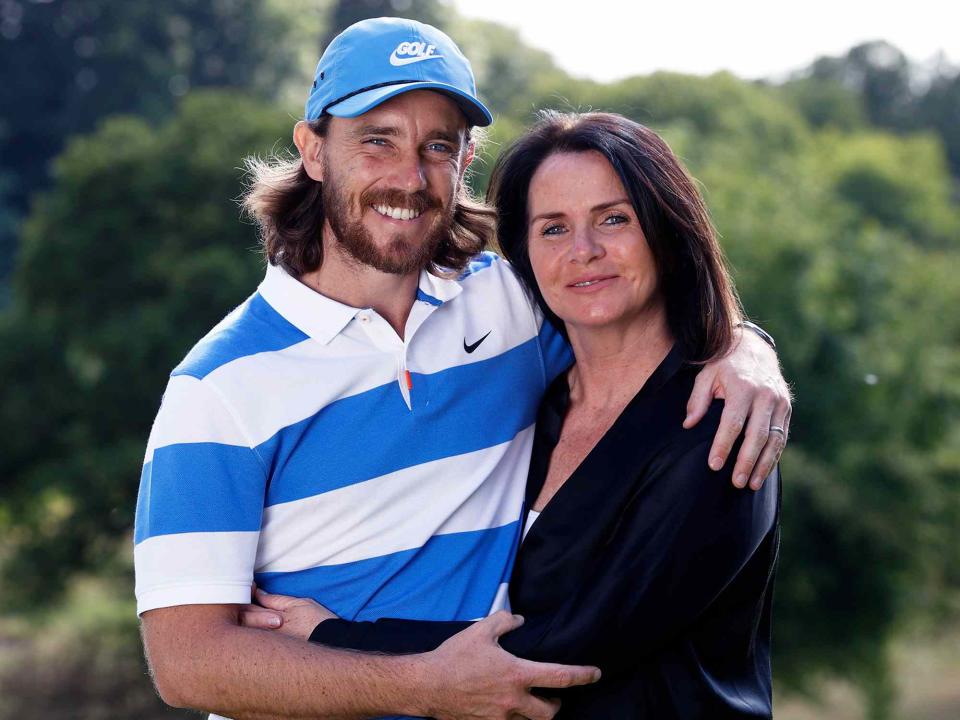 <p>Clive Brunskill/Getty</p> Tommy Fleetwood with his wife Clare Fleetwood in May 2000.