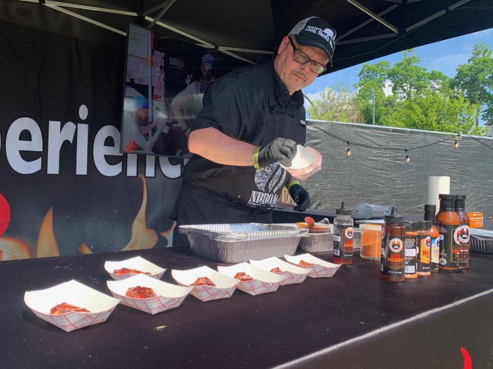 Chef Ray Sheehan prepares samples of his wings for spectators to taste during a cooking demonstration at SmokeSlam on May 17, 2024, at Tom Lee Park in Downtown Memphis.