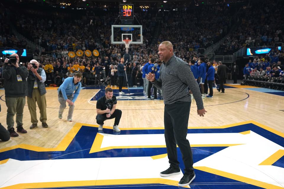 New Milwaukee Bucks head coach Doc Rivers speaks to the crowd at the Marquette-Seton Hall men’s basketball game Saturday at Fiserv Forum. The 62-year-old Marquette alumnus became the 18th head coach in Bucks history on Friday, after signing a multi-year deal.