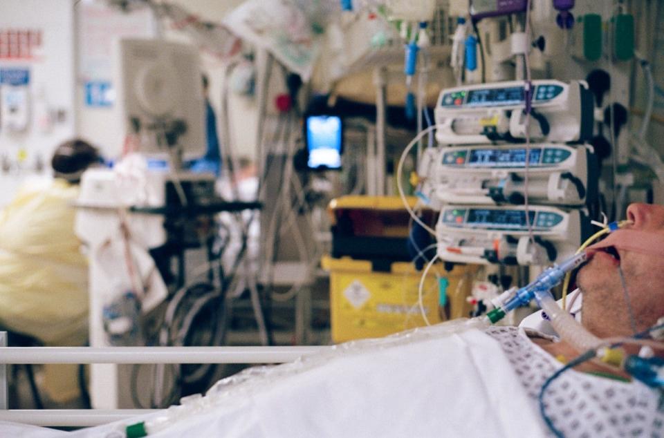 A patient attached to a life-supporting ventilator, in an induced comaDr Nabeel Siddiqui