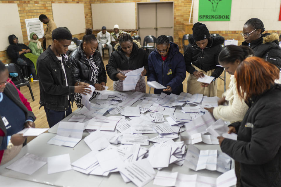 Election volunteers count ballots at Craighall Park Elementary school in Johannesburg, South Africa, Wednesday May 29, 2024. (AP Photo/Jerome Delay)