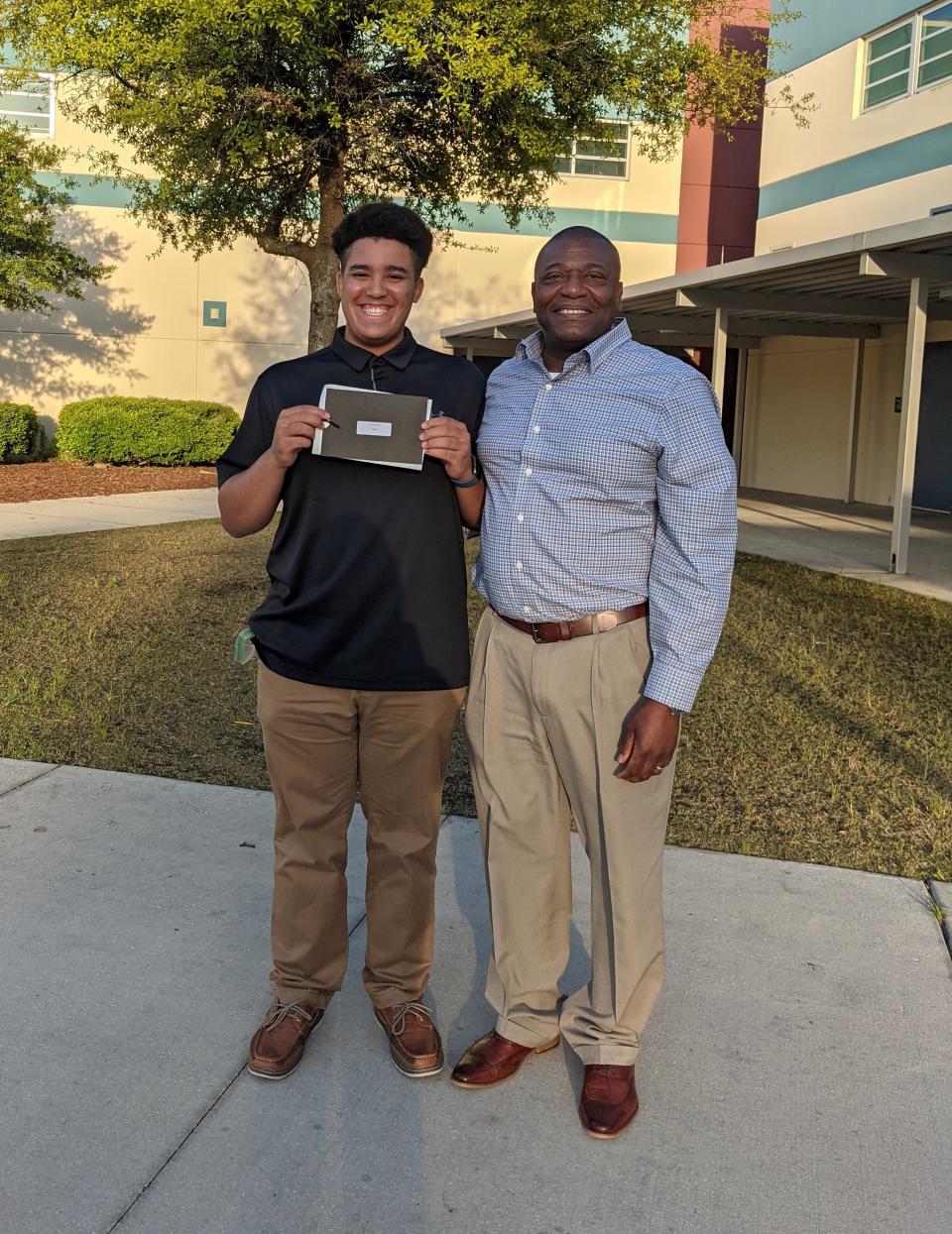 David VanLue (left) has worked at Vicar's Landing for three years and earned a scholarship towards his college education at Florida State University.