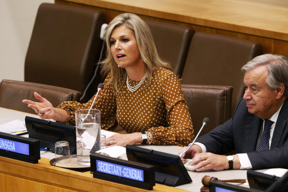 FILE - In this Wednesday, Sept. 25, 2019 file photo, Queen Maxima of the Netherlands is joined by United Nations Secretary-General Antonio Guterres as she delivers remarks at a side event regarding financial inclusion for development during the 74th session of the U.N. General Assembly, at U.N. headquarters. As the British royal family wrestles with the future roles of Prince Harry and his wife Meghan, it could look to Europe for examples of how princes and princesses have tried to carve out careers away from the pomp and ceremony of their families’ traditional duties. Willem-Alexander’s wife Maxima has plenty of royal duties but also acts as the United Nations Secretary-General’s Special Advocate for Inclusive Finance for Development. (AP Photo/Jason DeCrow, File)